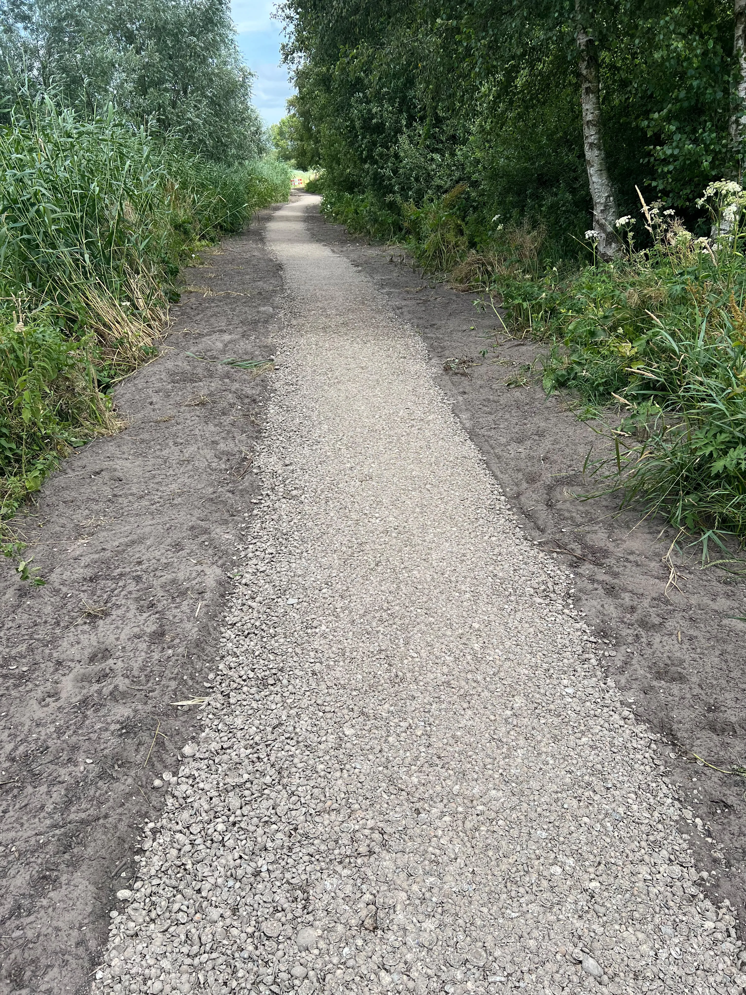 Grindpad aanleggen in natuurgebied