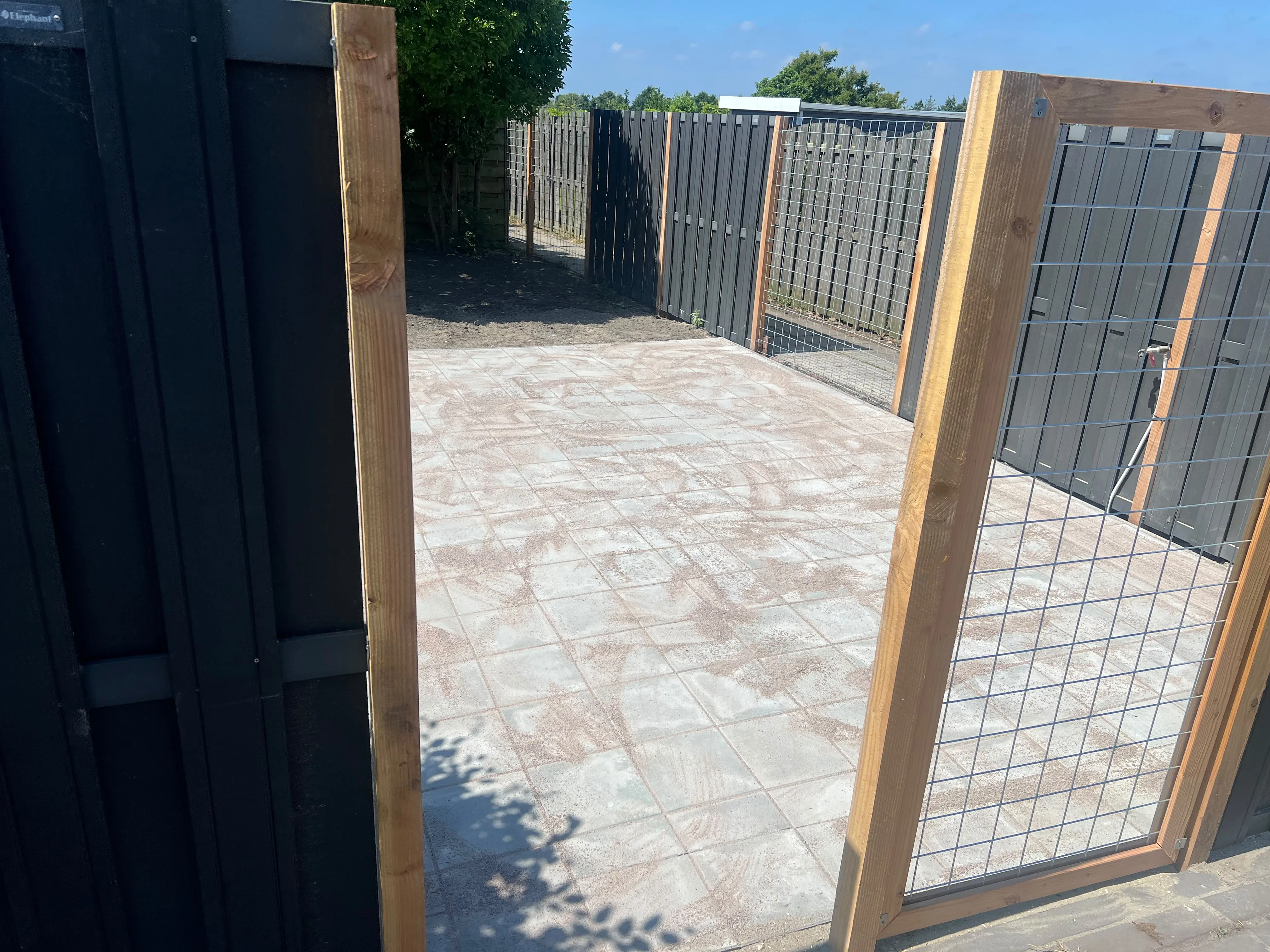 Sierbestrating leggen in achtertuin